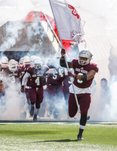 Ottawa GeeGees exiting the tunnel onto the field during the Panda Game
