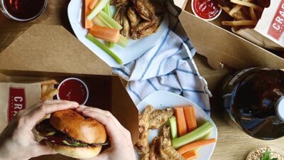 Image of items available to order off the Craft Beer market menu including hamburgers, wings and fries